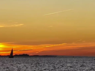 Sunset mit Segelschiff bei Fehmarn